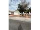 Single story home with drought-tolerant landscaping, featuring a two-car garage at 3729 Bronco Billy Ct, Las Vegas, NV 89129