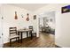 Inviting dining area with wood-look floors and wall decorations at 3982 Voxna St, Las Vegas, NV 89119