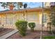 Cozy single-story home featuring stone accents and security bars on the windows at 3982 Voxna St, Las Vegas, NV 89119