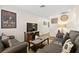 Cozy living room features a large television, comfortable seating, and natural light at 3982 Voxna St, Las Vegas, NV 89119