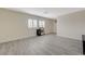 Bright living room with shutters and laminate flooring at 4 Tarryall Ter, Henderson, NV 89074