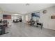 Open-concept living space with hardwood floors and ample room for both office and dining space at 4 Tarryall Ter, Henderson, NV 89074