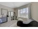 Well-lit main bedroom featuring wood floors, a large window and plenty of storage space at 4 Tarryall Ter, Henderson, NV 89074