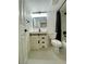 Bathroom with modern sink, tiled floors, dark hardware and white walls at 4248 Tara Ave # 2, Las Vegas, NV 89102