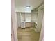 Walk-in closet with modern shelving, drawers, overhead lighting and hard wood floors at 4248 Tara Ave # 2, Las Vegas, NV 89102