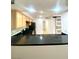 Stylish kitchen with black countertops and stainless steel appliances at 4248 Tara Ave # 2, Las Vegas, NV 89102
