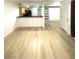 Spacious living room boasts modern flooring and leads to an open kitchen area at 4248 Tara Ave # 2, Las Vegas, NV 89102