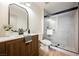 Updated bathroom features a glass shower, vanity and modern finishes at 427 Wright Way, Henderson, NV 89015