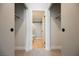 En-suite bathroom featuring updated fixtures and tile flooring, accessible through closet at 427 Wright Way, Henderson, NV 89015