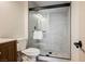 Modern bathroom featuring a glass-enclosed shower with gray tiling and updated fixtures at 427 Wright Way, Henderson, NV 89015