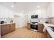 Bright updated kitchen with stainless steel appliances, two-tone cabinetry and lots of storage at 427 Wright Way, Henderson, NV 89015