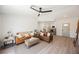 Bright and airy living room with a modern design, open to the kitchen and front door at 427 Wright Way, Henderson, NV 89015