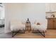 Bright sitting area featuring cozy accent chairs and light wood floors at 427 Wright Way, Henderson, NV 89015