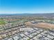 Expansive aerial shot of 4273 Sunrise Flats, highlighting the community layout and desert landscape at 4277 Sunrise Flats St, Las Vegas, NV 89135