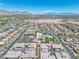 Aerial of neighborhood with central community center, featuring a pool, landscaping, and amenities at 4277 Sunrise Flats St, Las Vegas, NV 89135