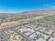 Stunning aerial view of 4273 Sunrise Flats, showcasing the neighborhood and mountain views at 4277 Sunrise Flats St, Las Vegas, NV 89135