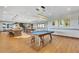 Beautiful amenity room with wooden floors and a pool table for entertaining at 4277 Sunrise Flats St, Las Vegas, NV 89135