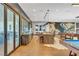 An amenity room with modern interior design, including a long table and chairs for dining at 4277 Sunrise Flats St, Las Vegas, NV 89135