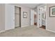 Bedroom with carpet, walk-in closet, and ensuite bathroom, offering comfort and convenience at 4277 Sunrise Flats St, Las Vegas, NV 89135