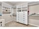 Spacious closet with custom built-in shelving and drawers, perfect for organized storage at 4277 Sunrise Flats St, Las Vegas, NV 89135