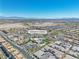 Community center aerial view showcasing pools, lush landscaping, and ample parking at 4277 Sunrise Flats St, Las Vegas, NV 89135