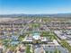 Aerial view of the community center showcasing the pool, tennis courts, and green spaces at 4277 Sunrise Flats St, Las Vegas, NV 89135