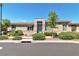 Charming single-story home with a stone accent entrance, lush landscaping, and a serene curb appeal at 4277 Sunrise Flats St, Las Vegas, NV 89135