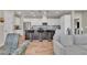 Open concept kitchen offers stainless steel appliances, large island, and breakfast bar seating at 4277 Sunrise Flats St, Las Vegas, NV 89135