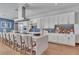 Modern kitchen featuring stainless steel appliances, a large island, and sleek cabinetry at 4277 Sunrise Flats St, Las Vegas, NV 89135