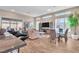 Spacious living room features a modern design, recessed lighting, and glass table at 4277 Sunrise Flats St, Las Vegas, NV 89135
