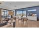 Comfortable lounge area with stylish seating and a beautiful view of the outdoor landscaping at 4277 Sunrise Flats St, Las Vegas, NV 89135