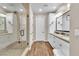 Spacious main bathroom offers double sinks and a walk-in glass shower at 4277 Sunrise Flats St, Las Vegas, NV 89135