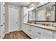Bright main bathroom features double sinks, quartz countertops, and ample storage space at 4277 Sunrise Flats St, Las Vegas, NV 89135