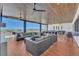 Beautiful outdoor covered patio featuring comfortable seating, ceiling fans, and scenic views at 4277 Sunrise Flats St, Las Vegas, NV 89135