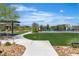 Outdoor pickle ball courts surrounded by lush greenery, perfect for active community living at 4277 Sunrise Flats St, Las Vegas, NV 89135