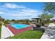 Well-maintained pickleball court with shaded seating and landscaping, perfect for outdoor recreation at 4277 Sunrise Flats St, Las Vegas, NV 89135