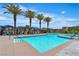 Relaxing pool area with cabanas and palm trees, offering a resort-style experience at 4277 Sunrise Flats St, Las Vegas, NV 89135