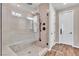 Luxurious walk-in shower offers dual shower heads and tile surround at 4277 Sunrise Flats St, Las Vegas, NV 89135