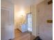 Bathroom featuring dual sink vanity and tiled shower with glass door at 5040 Spencer St # D, Las Vegas, NV 89119