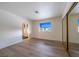 Bright bedroom featuring wood flooring, natural light, and closet at 5040 Spencer St # D, Las Vegas, NV 89119