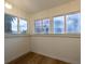 Bright bedroom with natural light, wood-look flooring, and neutral walls at 5040 Spencer St # D, Las Vegas, NV 89119