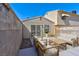 Cozy backyard area featuring comfortable outdoor seating, perfect for relaxing or entertaining guests at 5078 Mountain Vista St, Las Vegas, NV 89120
