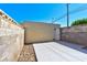 Enclosed backyard area featuring block walls and a door to the exterior at 5078 Mountain Vista St, Las Vegas, NV 89120