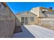 Private backyard featuring a concrete patio and secure perimeter walls at 5078 Mountain Vista St, Las Vegas, NV 89120