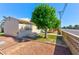 A single Gathering home on a corner lot and nice trees in the front yard at 5078 Mountain Vista St, Las Vegas, NV 89120