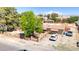 A high altitude picture of the property, showing the house, fenced in yard, and trees at 5262 Harris Ave, Las Vegas, NV 89110