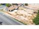 View of the property, showing the house and outbuilding on a lot that needs landscaping at 5262 Harris Ave, Las Vegas, NV 89110