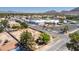 Aerial view of a house located near a school with mountain views at 5262 Harris Ave, Las Vegas, NV 89110