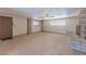 Cozy living room features tile floors, a fireplace, and natural light from windows, enhancing the inviting atmosphere at 5262 Harris Ave, Las Vegas, NV 89110
