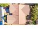 This aerial view shows the roof, driveway, and surrounding landscaping of this well-maintained property at 5412 Dalle Valley St, North Las Vegas, NV 89031